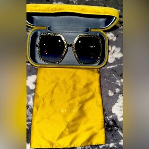 Authentic Gucci sunglasses with case and dust bag